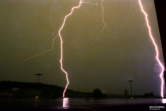 Double close lightning strikes hit the ground in the Pittsburgh, PA suburb of Green Tree in July of 1995
