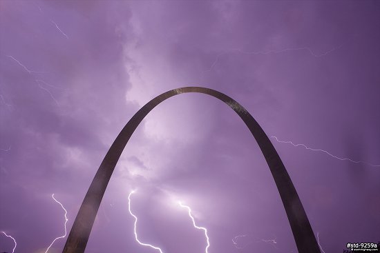 Lightning behind the Gateway Arch at night