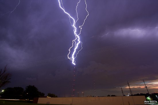Lightning striking the KSDK TV tower in St. Louis at sunrise on July 10, 2013