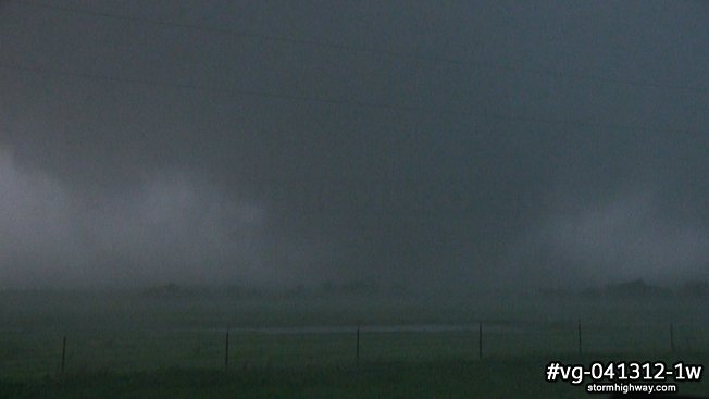 A large tornado near Cooperton, Oklahoma emerges from the rain at close range
