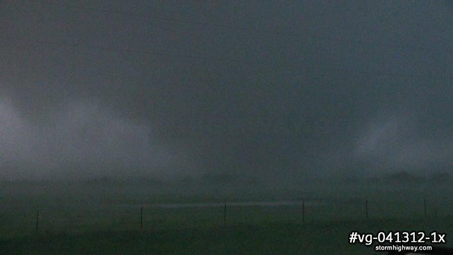 A large tornado near Cooperton, Oklahoma emerges from the rain at close range
