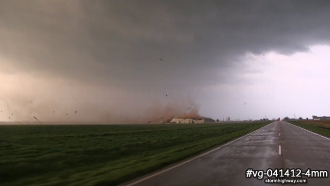 Tornado hitting a structure with debris at close range in Oklahoma