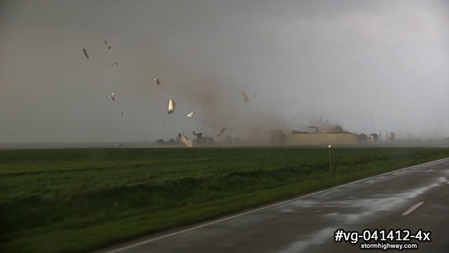 Tornado hitting a structure with debris at close range in Oklahoma