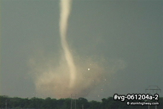 Tornado hitting a structure with debris at Mulvane, Kansas