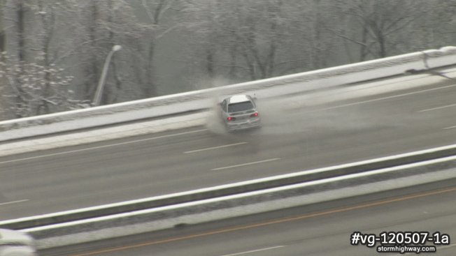 Car spinout on snowy interstate